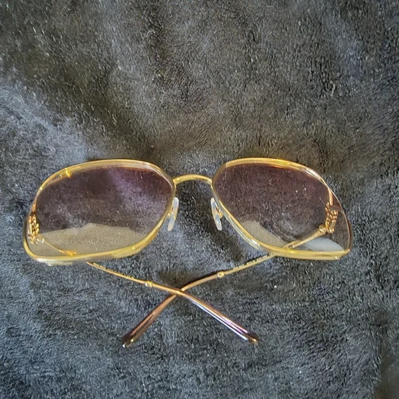 Miu Miu Gold and Pink Glasses with Chic Design